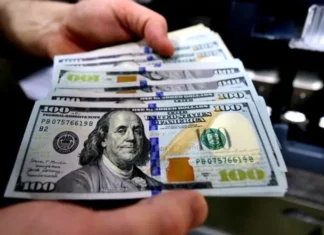 Government advisor: New monetary reinforcement mechanism will maintain fixed exchange rate of 1,320 dinars per $100