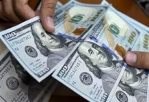 A slight rise in the dollar exchange rate in Baghdad markets.
