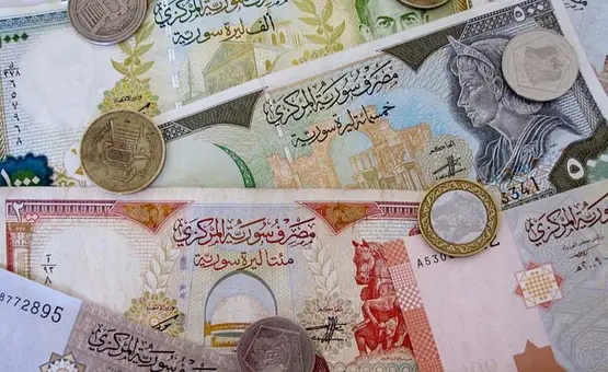 Syria removes two zeros from its currency and changes its shape Syria removes two zeros from its currency and changes its shape
