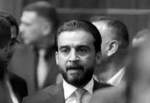 Politician: Halbousi’s party punishes Anbar Electricity employee for attending an opposition political event. Politician: Halbousi's party punishes Anbar Electricity employee for attending an opposition political event.