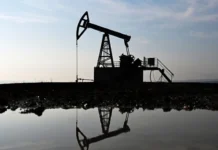 Oil prices dipped slightly as the year-end holiday approached.