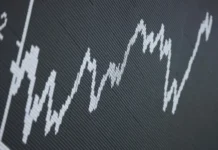 Asian stock markets mixed as traders weigh US data, await jobs