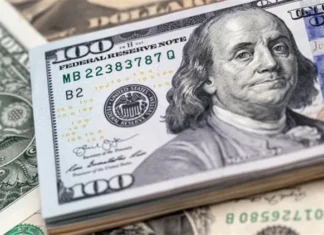 The dollar hits its lowest level in four years.