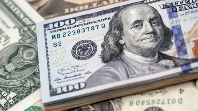 The dollar hits its lowest level in four years.