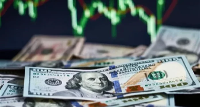 The dollar is nearing a two-week high.