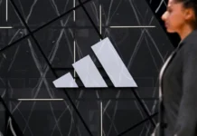 Adidas shares slump on downbeat profit outlook Adidas shares slump on downbeat profit outlook