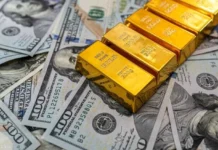 Gold jumps more than 2% as the dollar weakens