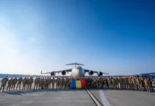 Romania withdraws 117 troops from Iraq after NATO's mission in the country is modified.