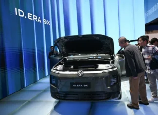 Volkswagen warns of more cost cuts as profits plunge