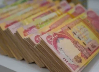 An economist explains the obstacles to implementing a new salary scale for employees.