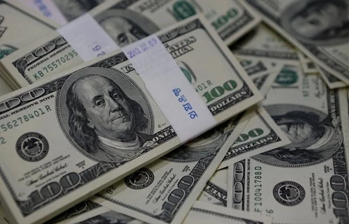 The dollar is holding steady near a one-week high ahead of the Federal Reserve chairman's speech in Jackson Hole. The dollar is holding steady near a one-week high ahead of the Federal Reserve chairman's speech in Jackson Hole.