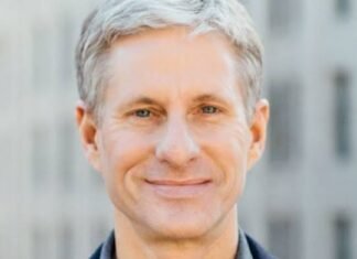 Ripple co founder Chris Larsen faces Flock protest