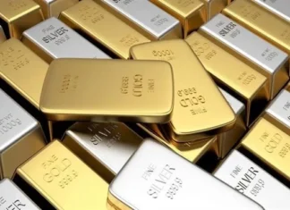Gold rises as the dollar and oil prices weaken, and markets await developments in the Middle East.