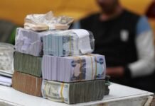 US dollar reaches 157,000 IQD in Baghdad and Basra on Sunday