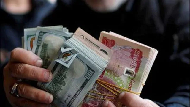Determining a new commission for banks and exchange companies from Iraqi travelers