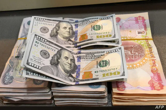 IRAQ-ECONOMY 21 years of Iraqi Dinar exchange rate fluctuations, 3 main factors