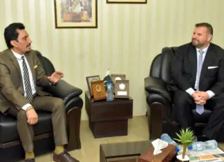 Kanawi discusses with the Central Bank Governor enhancing banking services and supporting development projects.